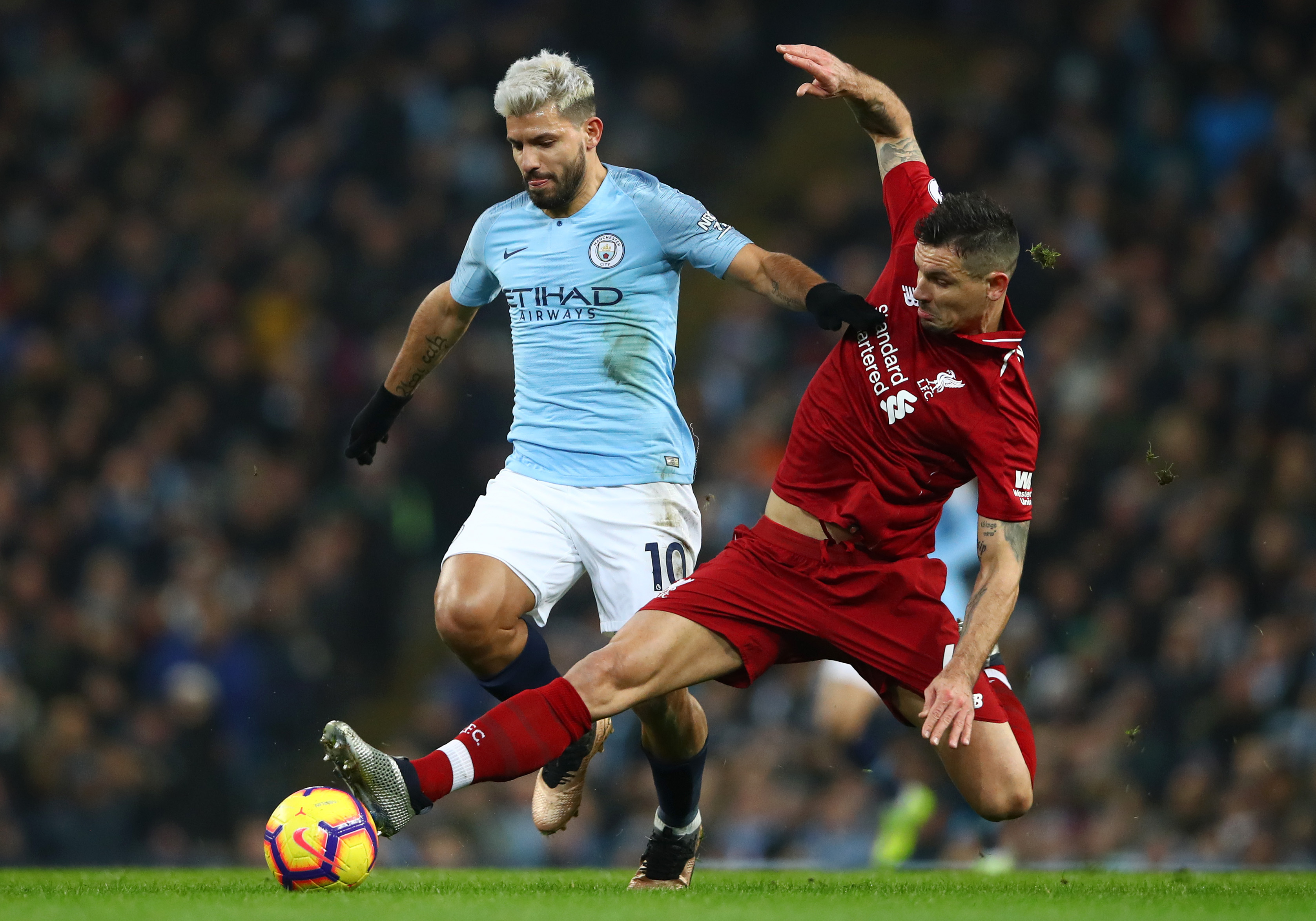 Dejan Lovren and Sergio Aguero.