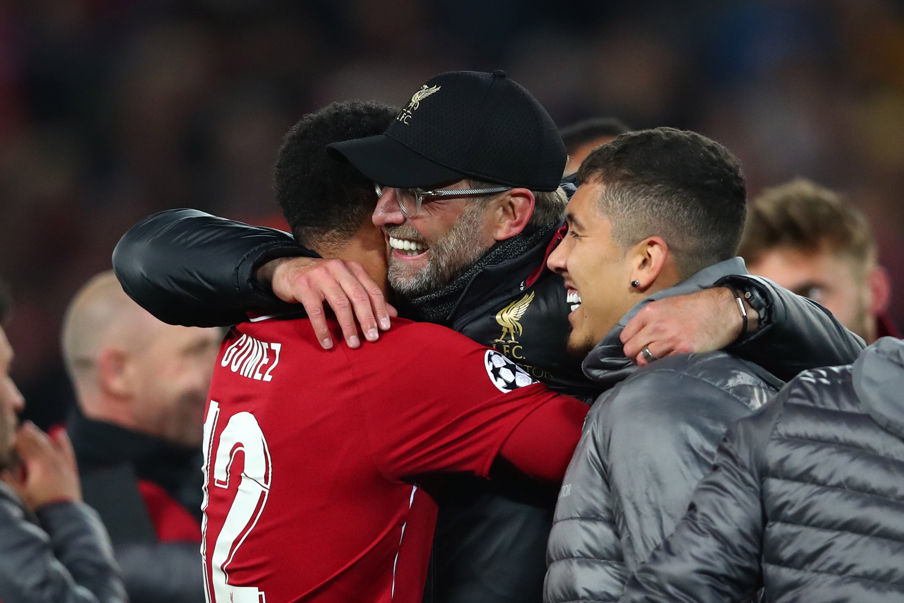 Jurgen Klopp, Joe Gomez and Roberto Firmino.