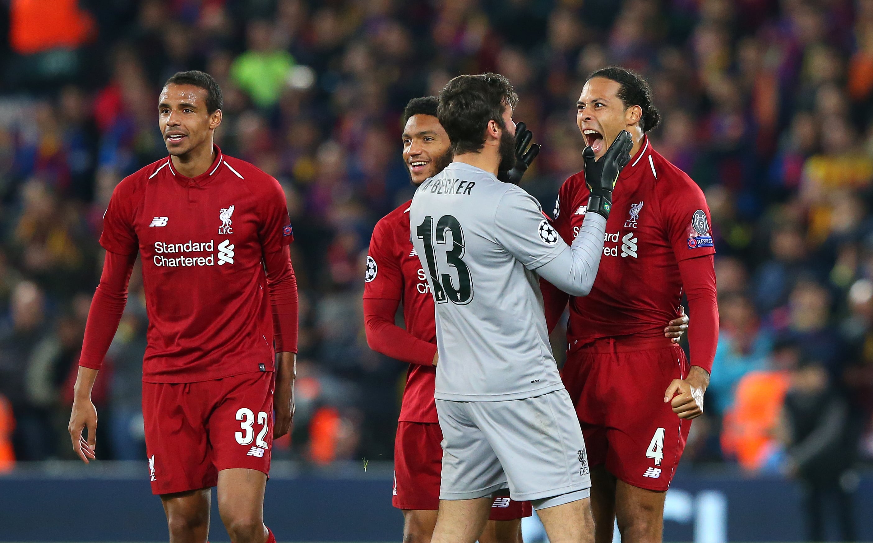 Alisson Becker and Virgil van Dijk.