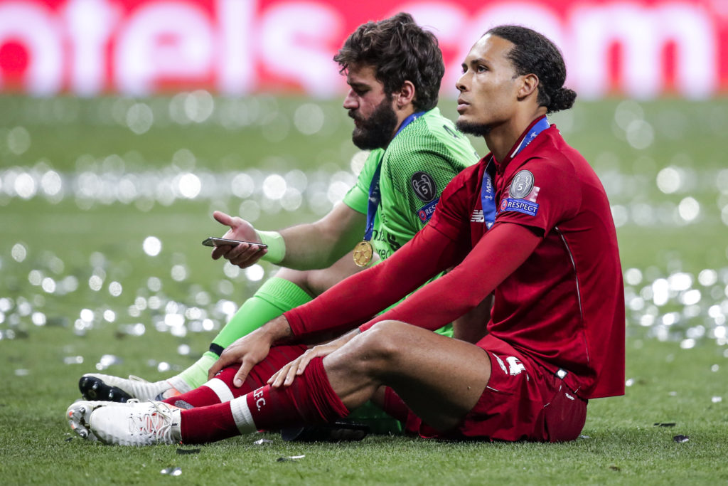 Alisson Becker and Virgil van Dijk.