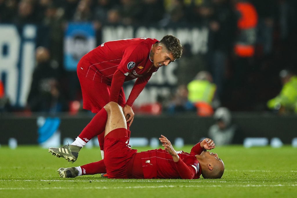 Roberto Firmino and Fabinho after the latters injury