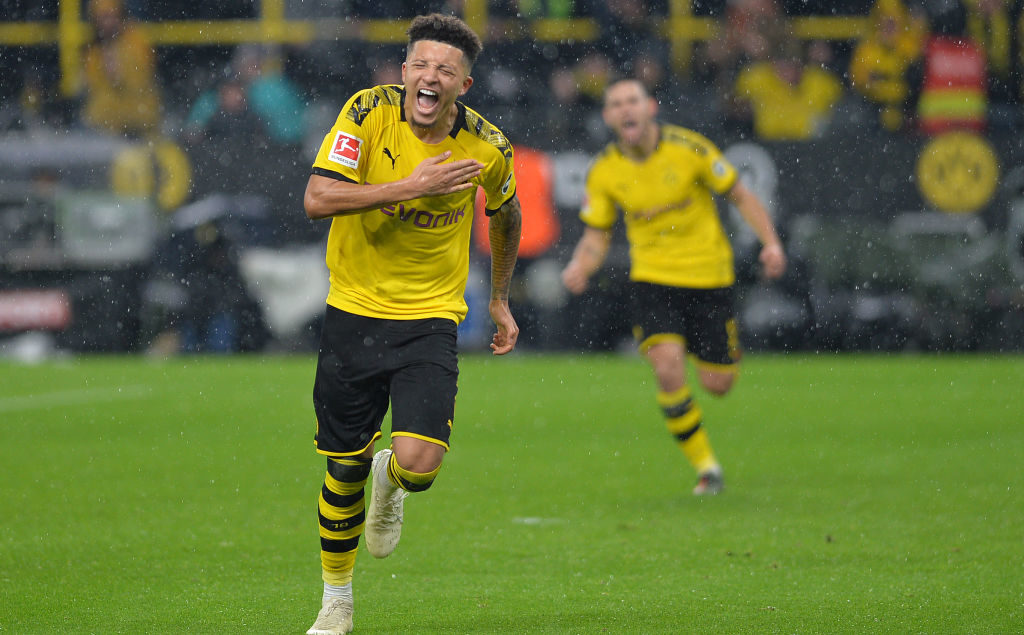 Jadon Sancho celebrates
