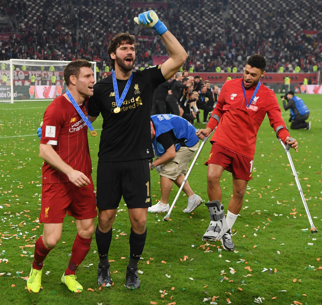James Milner and Alisson celebrate winning the Club World Cup v Flamengo