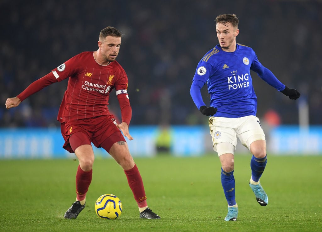 Jordan Henderson keeps the ball away from James Maddison