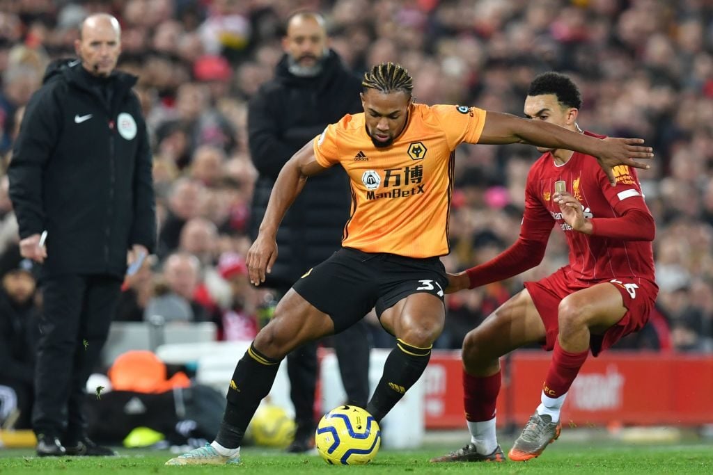 Adama Traore takes on Trent Alexander-Arnold