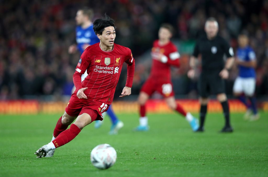 Takumi Minamino made his debut as a centre-forward against Everton.