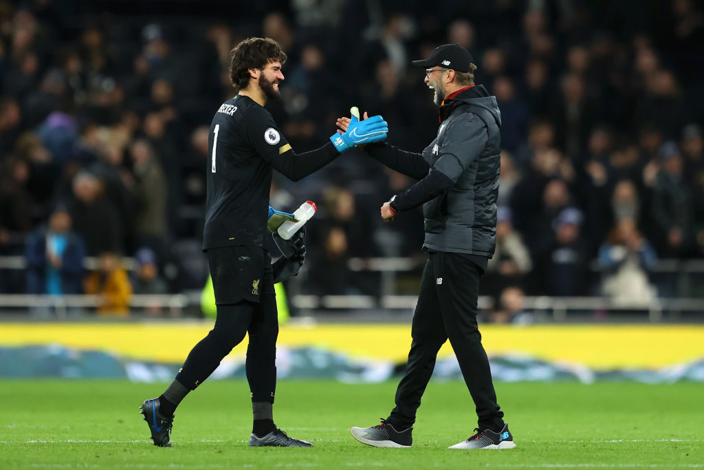 Jurgen Klopp congratulates Alisson on his clean sheet.