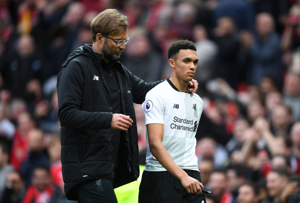 Jurgen Klopp consoles Trent Alexander-Arnold after a difficult performance against Manchester United.