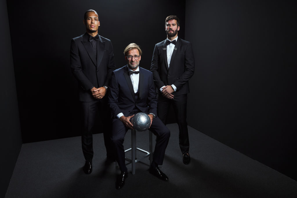 Virgil van Dijk, Alisson Becker, and Jurgen Klopp.