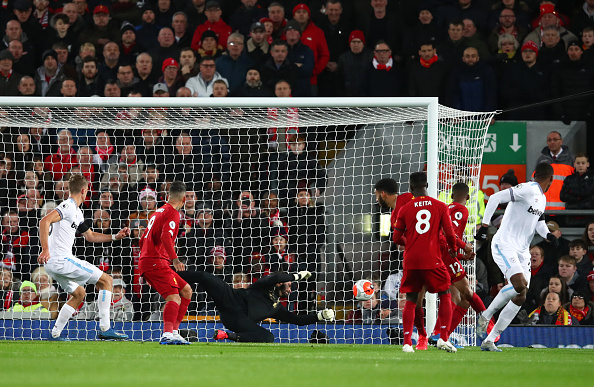 Issa Diop scores from a corner at Anfield.