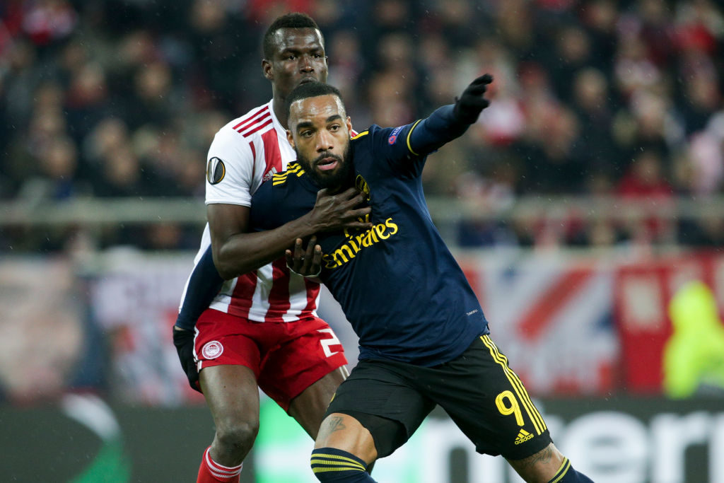 Ousseynou Ba battles with Alexandre Lacazette.