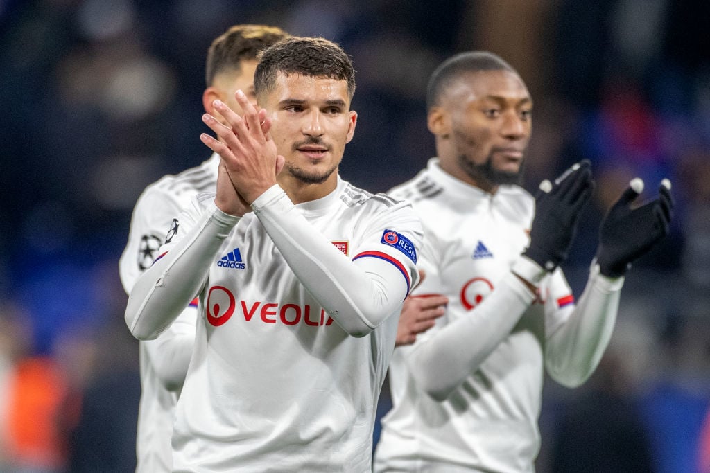 Houssem Aouar applauds the Lyon support.
