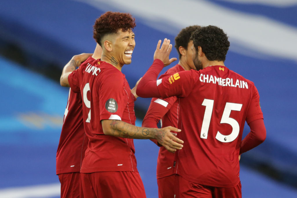 Liverpool celebrate scoring against Brighton.