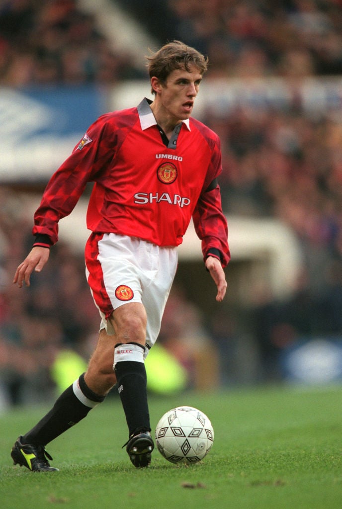 Phil Neville believes Liverpool will be challenged by Manchester United this season.