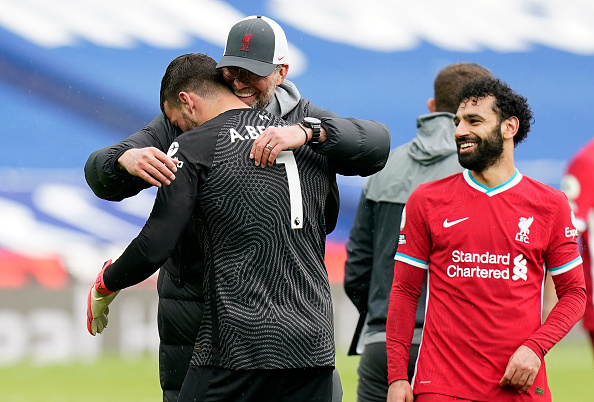 Jurgen Klopp celebrates victory with Alisson of Liverpool following the Premier League match between West Bromwich Albion and Liverpool at The Hawthorns