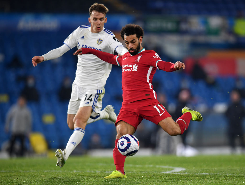 Diego Llorente defending Mohamed Salah.