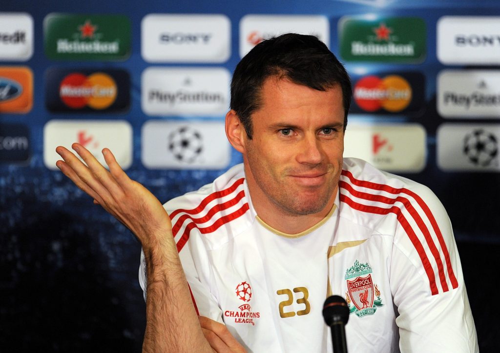 Jamie Carragher of Liverpool attends a press conference at the Ferenc Puskas Stadium ahead of the UEFA Champions League group E match between Debrecen and Liverpool