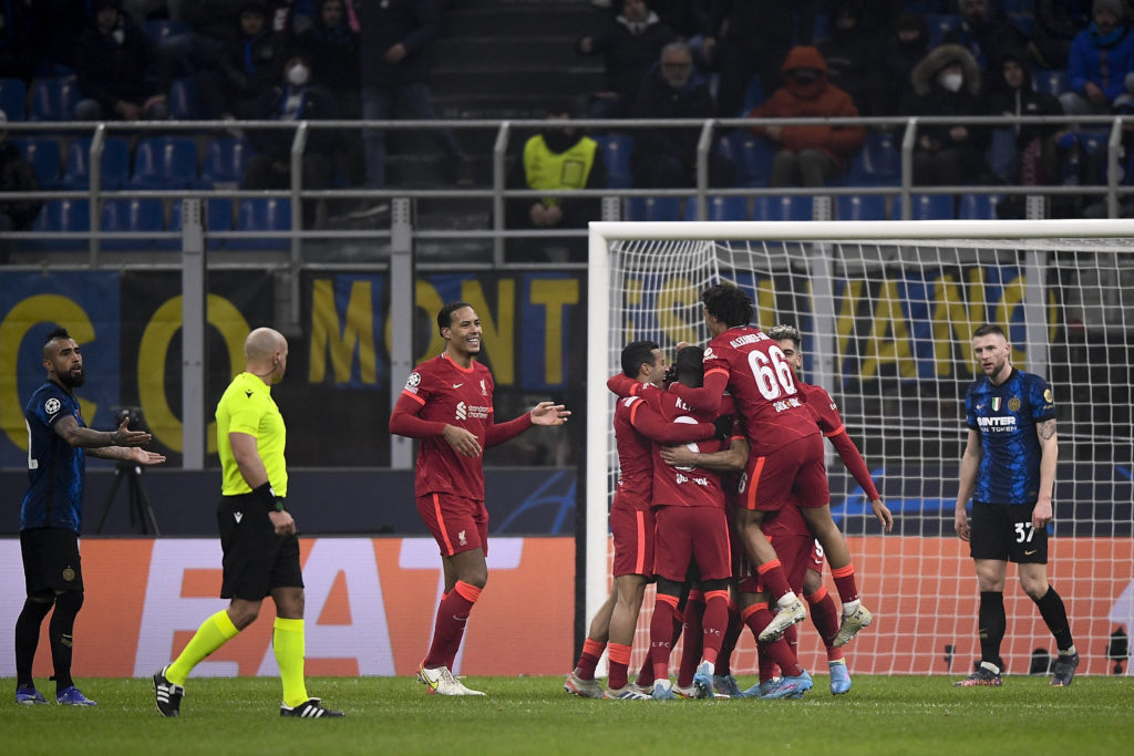 Mohamed Salah (C) of Liverpool FC celebrates with his