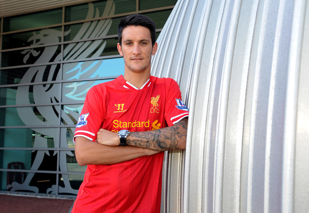 Luis Alberto poses as he signs a new contract for Liverpool Football Club at Melwood Training Ground