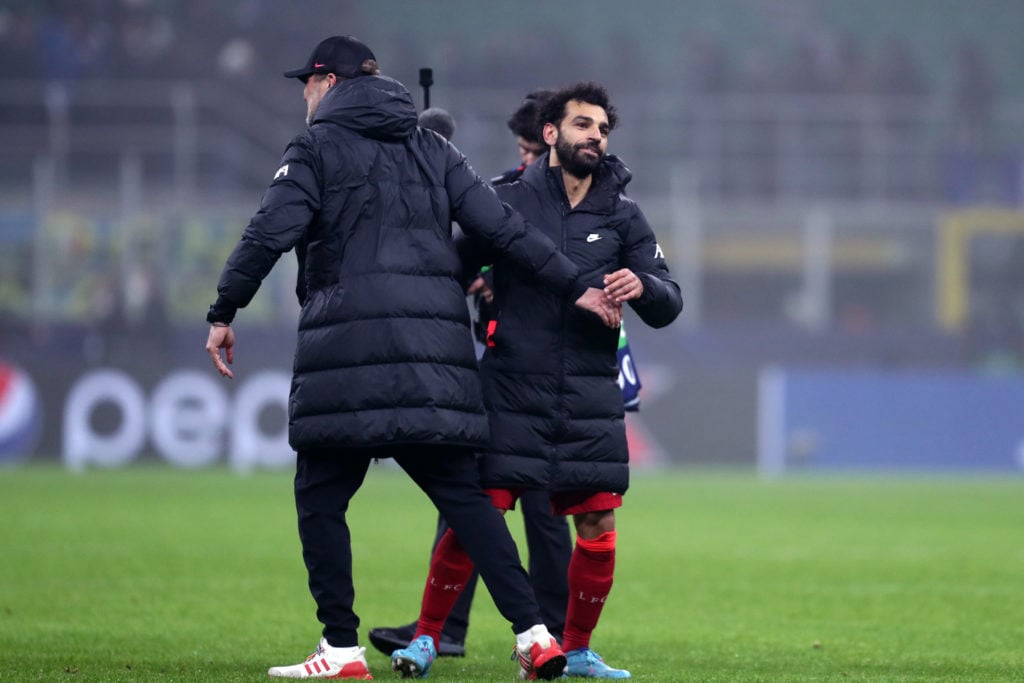 Jurgen Klopp, head coach of Liverpool Fc (L) embraces