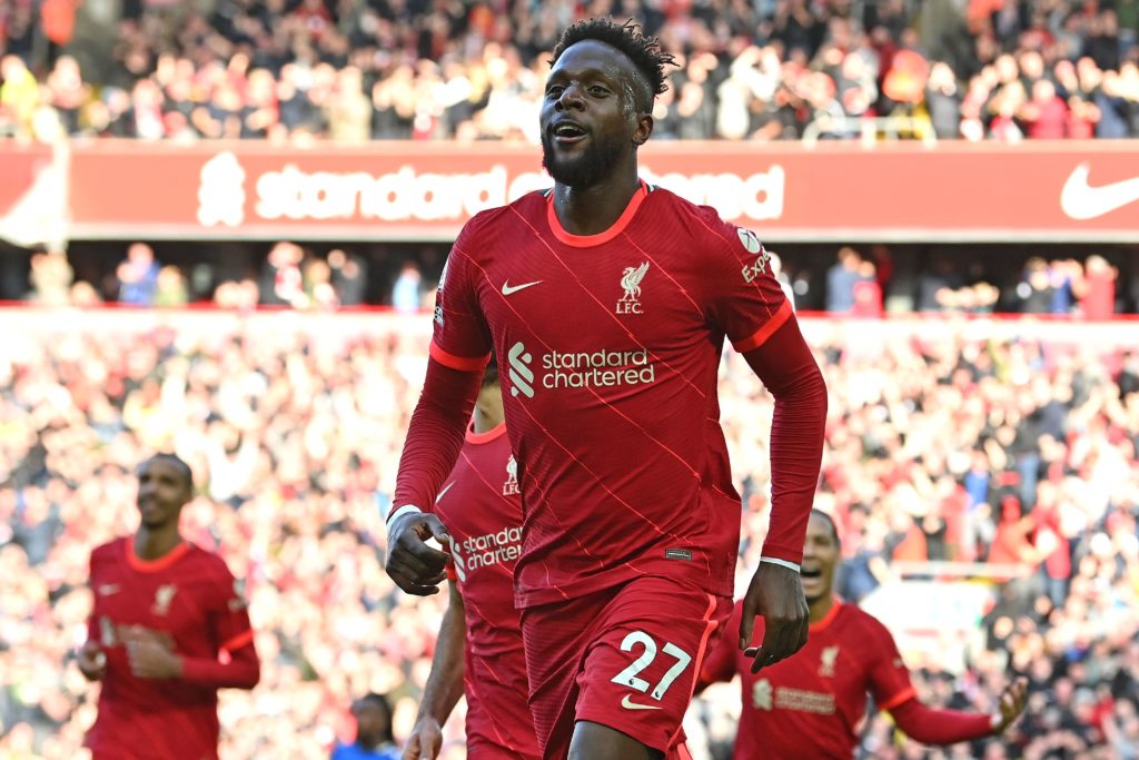 Liverpool's Belgium striker Divock Origi celebrates scoring the team's second goal during the English Premier League football match between Liverpool and Everton at Anfield in Liverpool