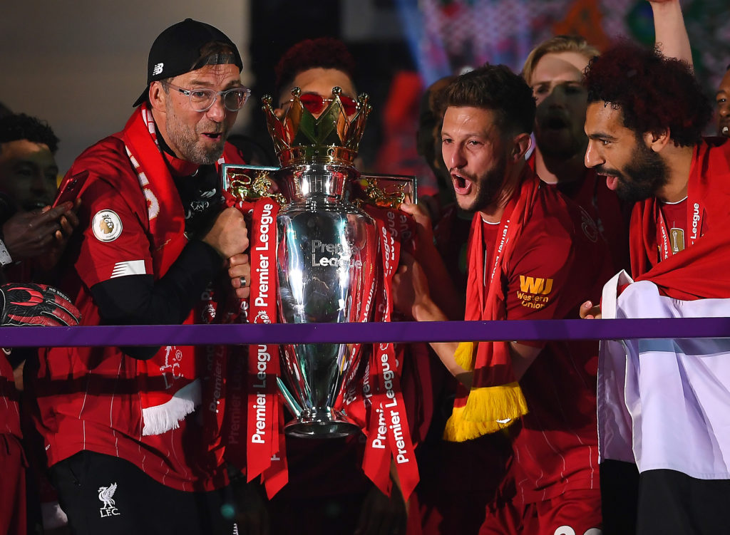 Jurgen Klopp lifting the Premier League title Liverpool won in the 2019-20 season.
