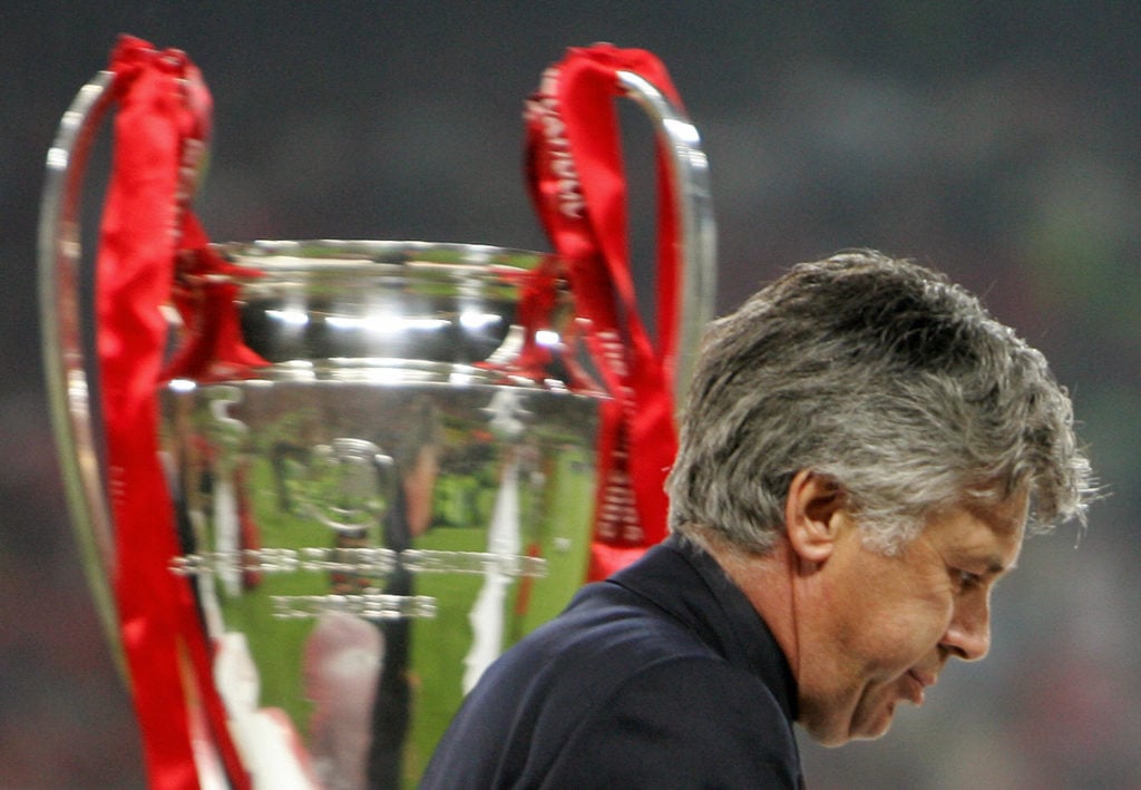 AC Milan's coach Carlo Ancelotti walks b