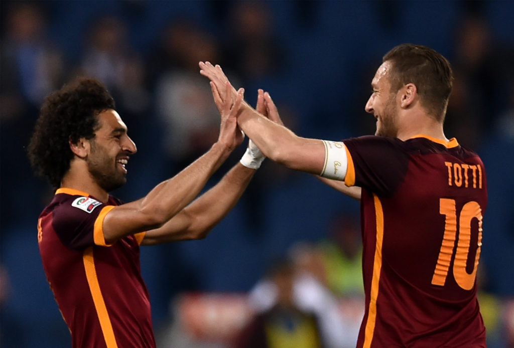 Mohamed Salah celebrates with Francesco Totti after scoring for Roma against Bologna in the Serie A match at Stadio Olimpico