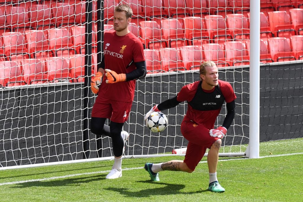Liverpool's Belgian goalkeeper Simon Mignolet (L) and Liverpool's German goalkeeper Loris Karius attends a training session and media day at Anfield stadium in Liverpool, north west England on May 21, 2018, ahead of their UEFA Champions League final