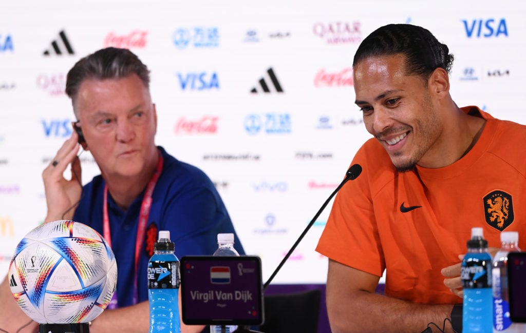 Louis van Gaal attends a press conference with captain Virgil van Dijk during the 2022 Qatar World Cup for the Netherlands.