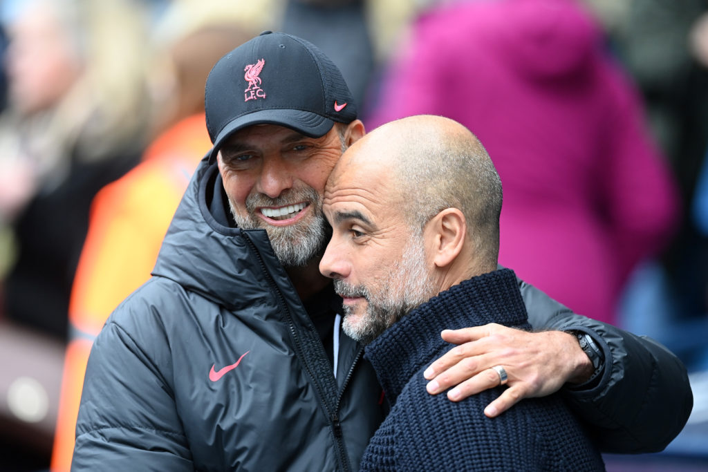Jurgen Klopp and Pep Guardiola embrace ahead of the Premier League match between Manchester City and Liverpool at the Etihad Stadium.