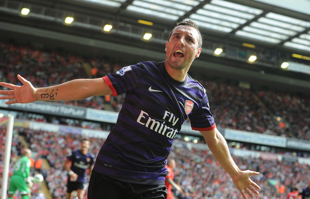 Santi Cazorla celebrates scoring the 2nd Arsenal goal during the Barclays Premier League match between Liverpool and Arsenal at Anfield