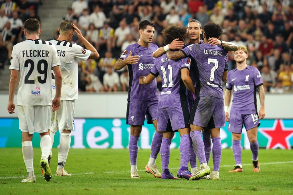 Liverpool forward Mohamed Salah celebrates scoring in UEFA Europa League against LASK