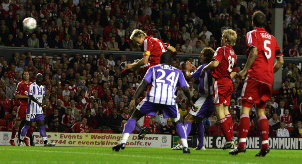 Liverpool's Sami Hyypia (C) scores again