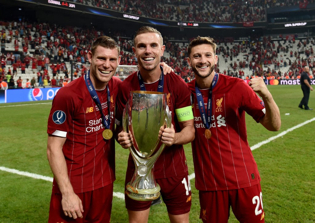Jordan Henderson, Adam Lallana and James Milner win trophy for Liverpool