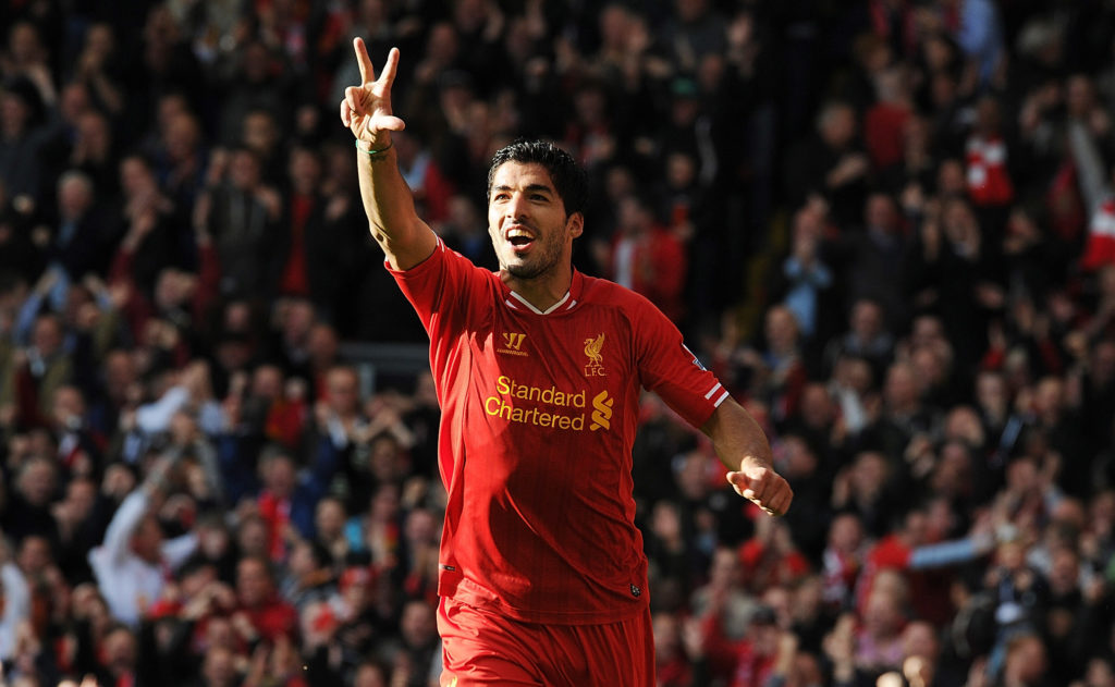 Luis Suarez of Liverpool celebrates his second goal during the Barclays Premier League match between Liverpool and West Bromwich Albion at Anfield