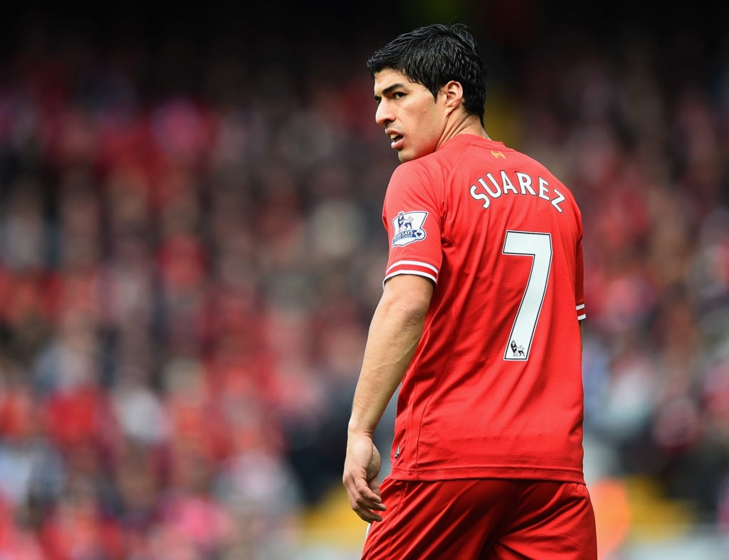 Luis Suarez of Liverpool looks on during the Barclays Premier League match between Liverpool and Newcastle United at Anfield