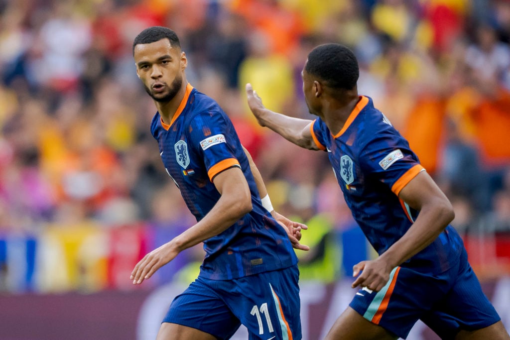 Cody Gakpo and Denzel Dumfries during Romania v Holland