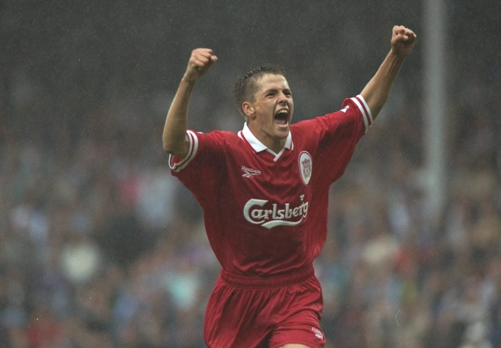 Michael Owen pictured celebrating after scoring a goal for Liverpool.