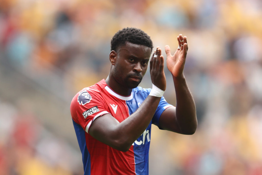 Marc Guehi of Crystal Palace applauds the fans after the Premier League match between Wolverhampton Wanderers and Crystal Palace at Molineux