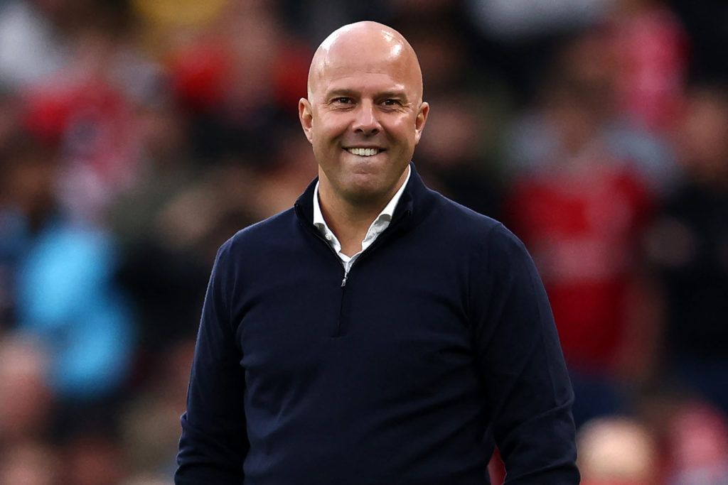 Liverpool's Dutch manager Arne Slot smiles on the touchline during the English Premier League football match between Liverpool and Brentford at Anfield