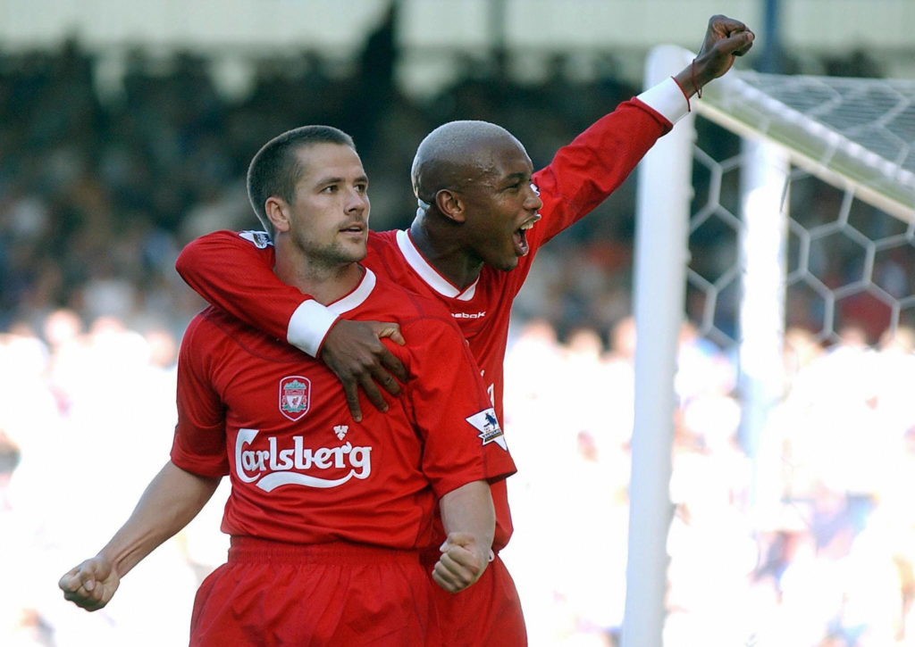 Liverpool's Michael Owen (L) celebrates