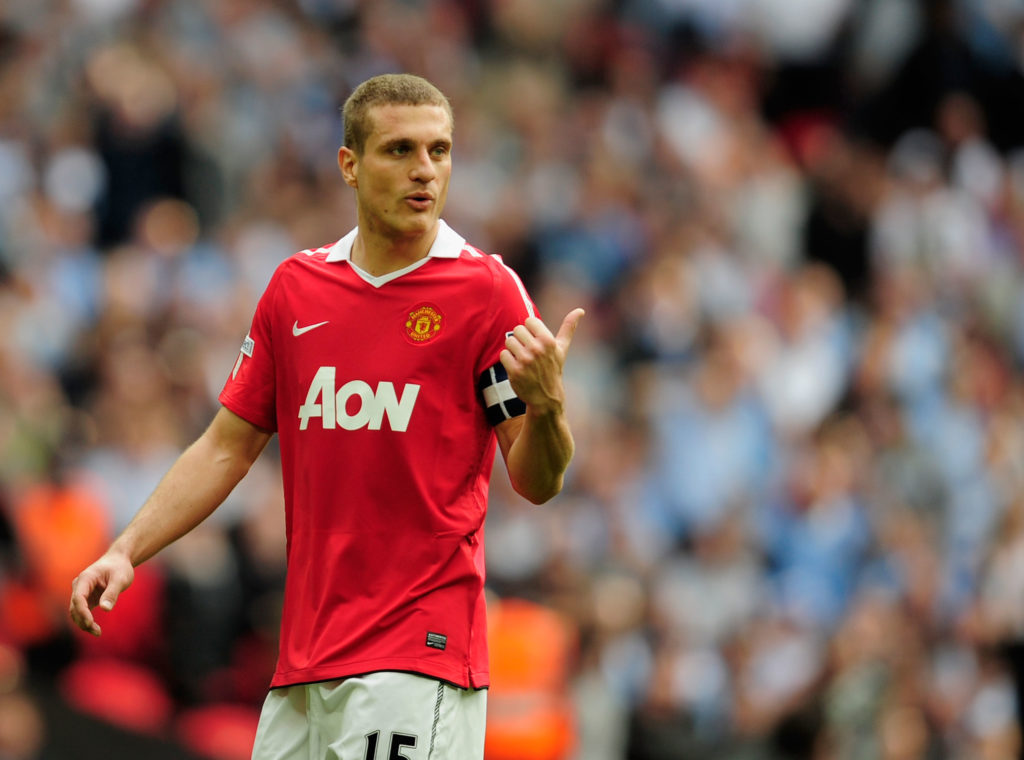Nemanja Vidic of Manchester United gestures during the FA Cup sponsored by E.ON semi final match between Manchester City and Manchester United at Wembley Stadium