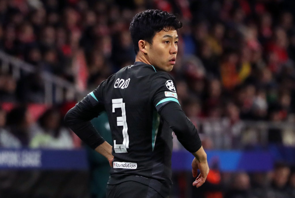 Wataru Endo pictured playing for Liverpool in the Champions League.