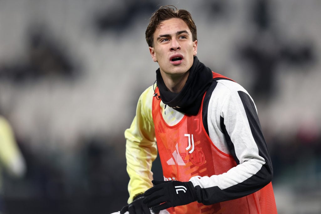 Juventus forward Kenan Yildiz warms up ahead of the Coppa Italia match against Cagliari.