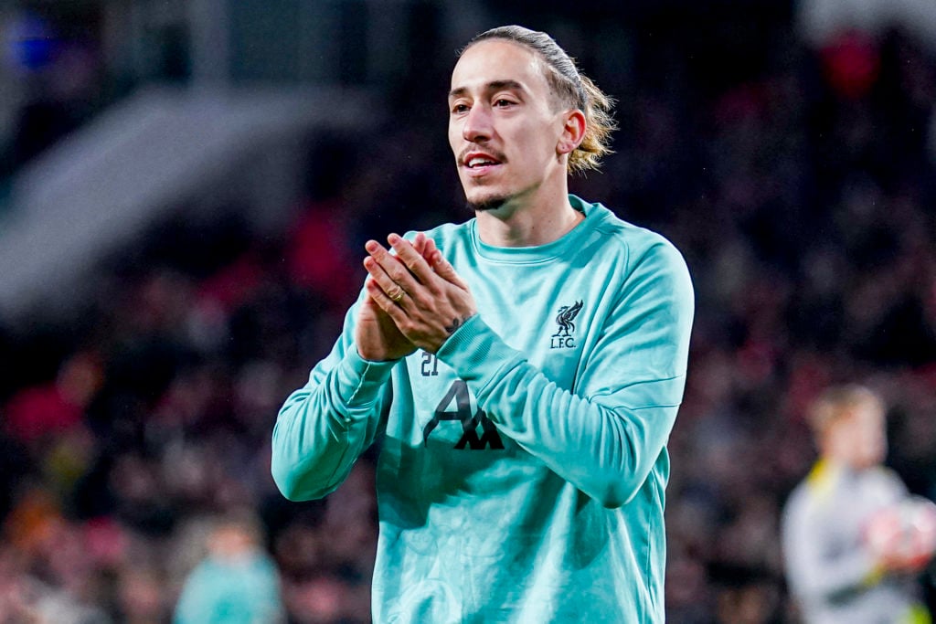 Kostas Tsimikas of Liverpool applauds prior to the UEFA Champions League 2024/25 League Phase MD8 match between PSV Eindhoven and Liverpool FC at PSV Stadion