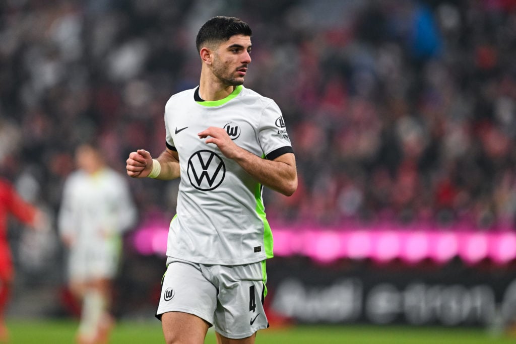 Wolfsburg defender, Konstantinos Koulierakis playing against Bayern Munich in the Bundesliga.