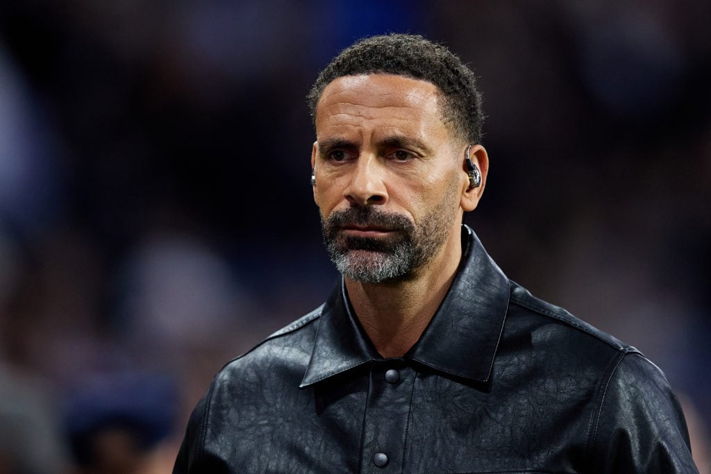 Rio Ferdinand pictured during his presenting duties for a Champions League game.