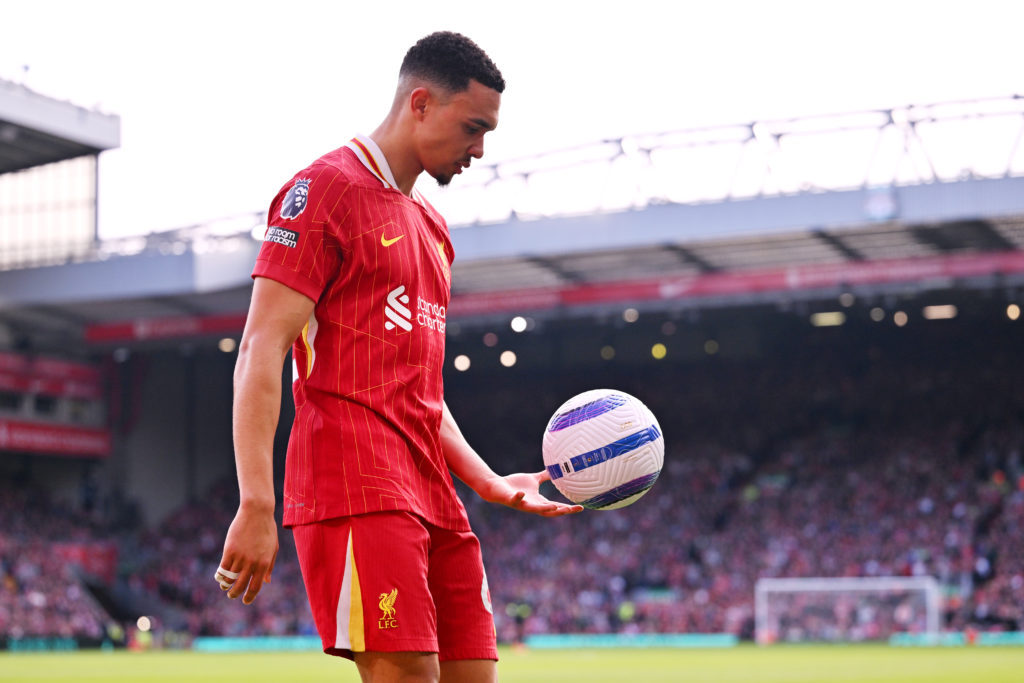 Trent Alexander-Arnold of Liverpool looks on, while holding the Nike Flight 2025 match ball during the Premier League match between Liverpool FC and Southampton FC at Anfield