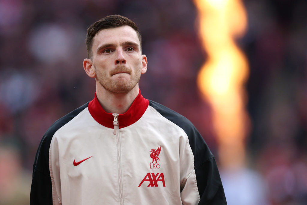Andy Robertson pictured lining up for Liverpool ahead of their Carabao Cup final against Liverpool.